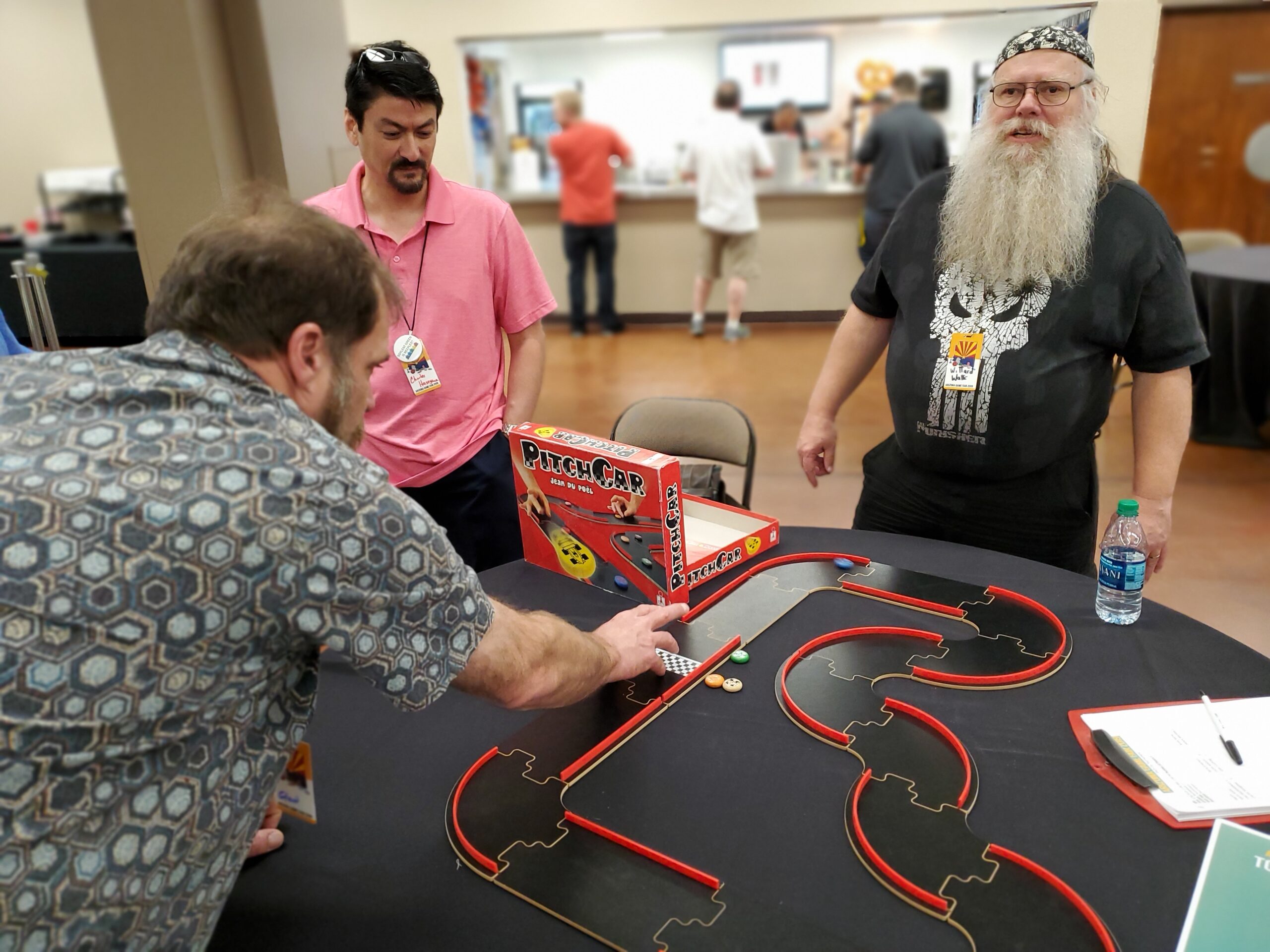 Gamers play in a Pitch Car tournament at Arizona Game Fair